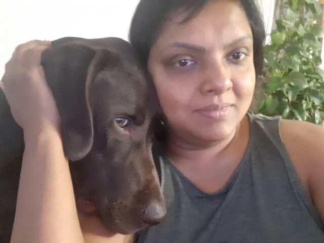 Aruna with her dog,