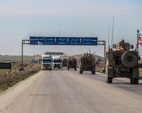 Photo of American armoured vehicles on a highway in Syria.