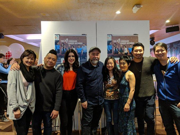 Photo of "Kim's Convenience" cast with Mike Yuan and Ruby Yuan.