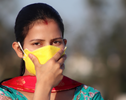 Photo of a South Asian woman wearing a face mask. The Indian COVID-19 crisis is taking a heavy toll on the diaspora too.