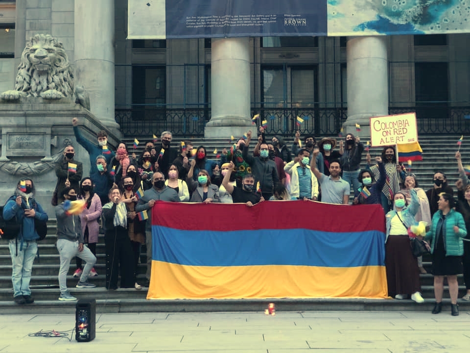 Activists pose for photo for Colombia