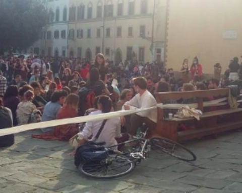 People in a square in Italy.