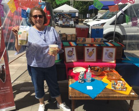 Mis Cazuelas products at a farmers' market