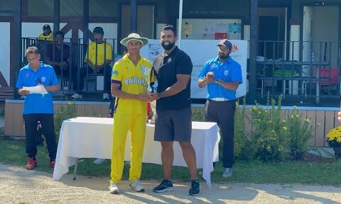 cricket player Gurshaan Dhaliwal being presented with awards