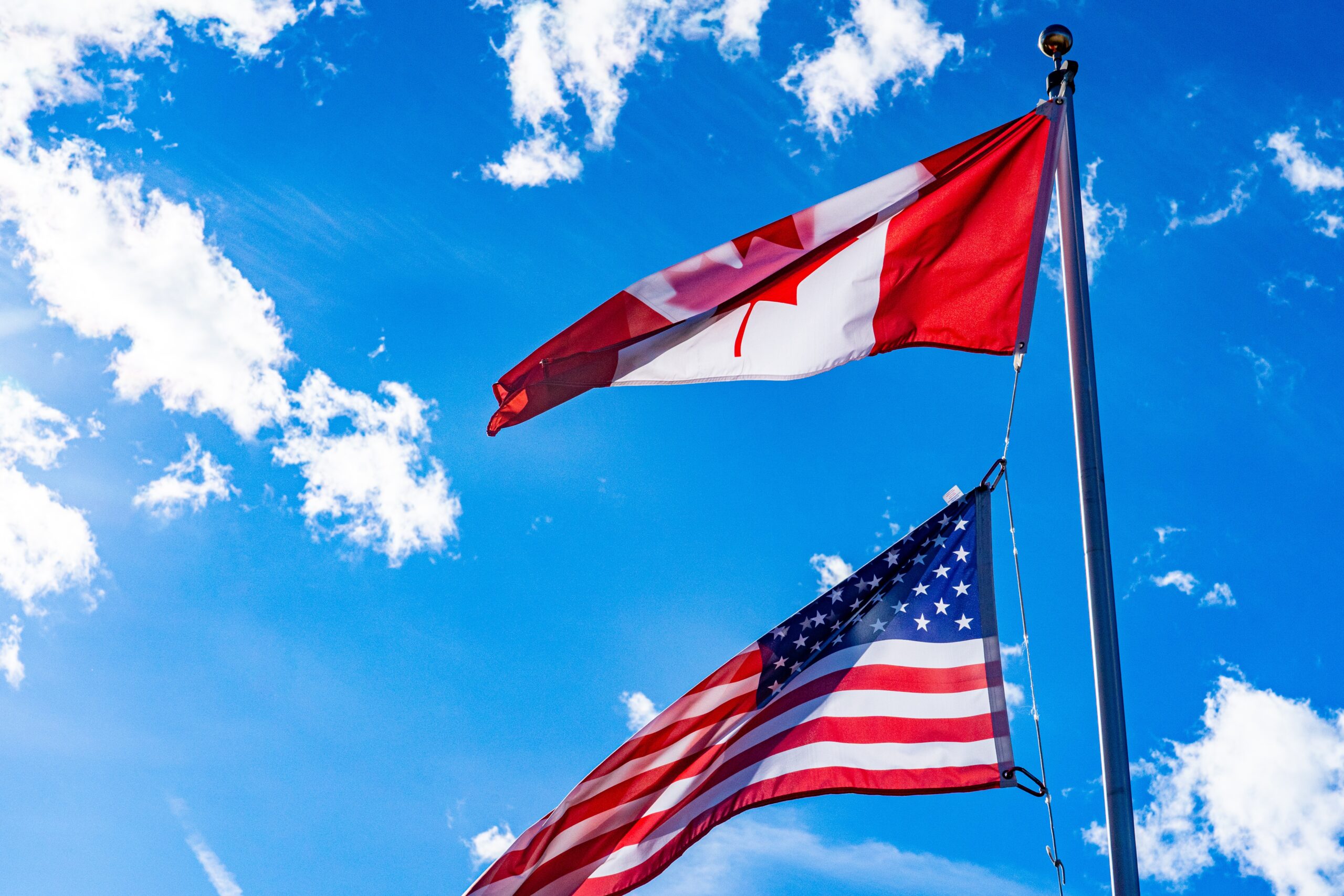 The United States and Canada are now vying for the same talent, with Canada unveiling a new program specifically targeting U.S.-based H-1B visa holders. Photo by Chris Robert on Unsplash.
